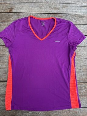 Reebok Purple V‑Neck Athletic Tee with Orange Trim